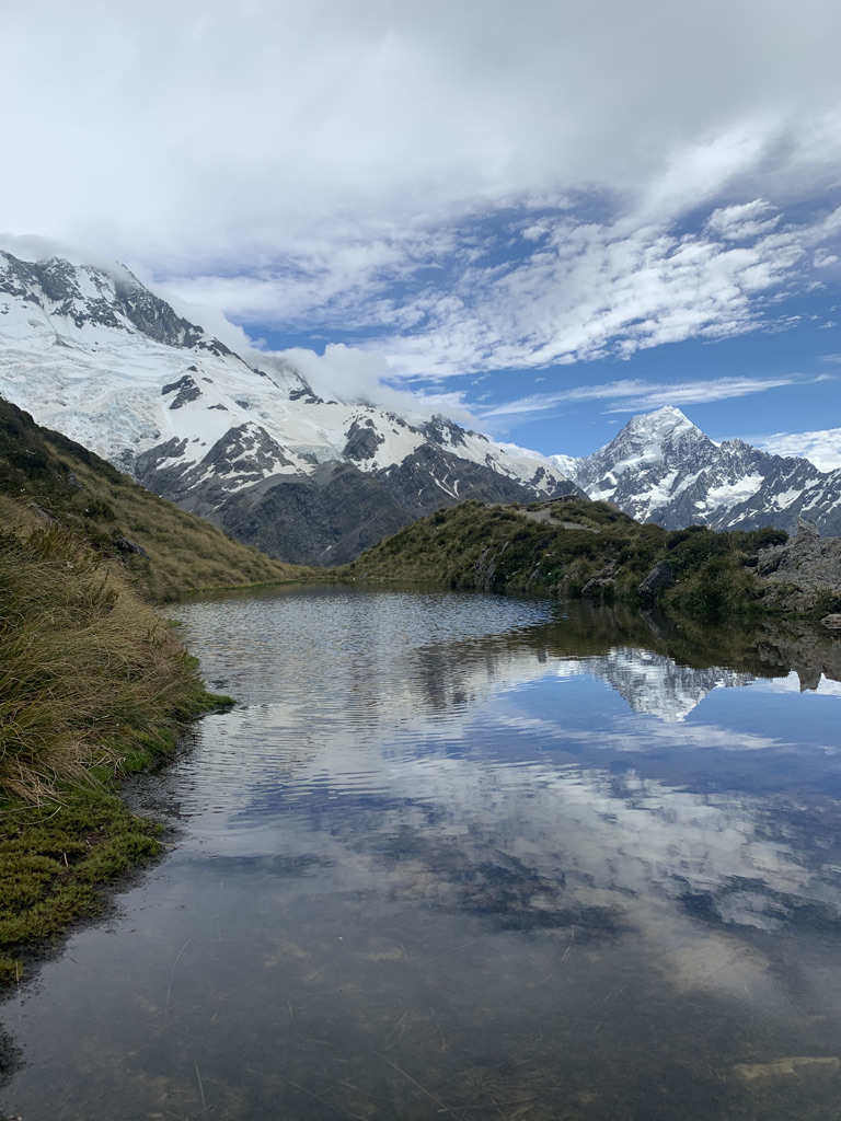 A glacial lake beneath the snow-capped peaks of Aoraki Mount Cook